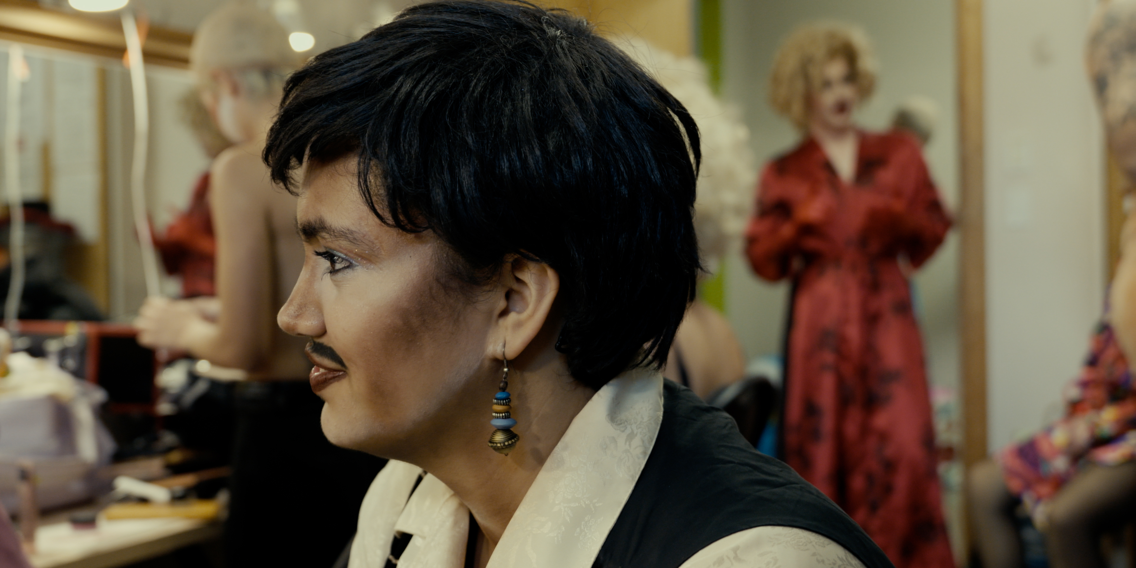 Drag king in costume and moustache backstage before a performance in Victoria Ka Raja